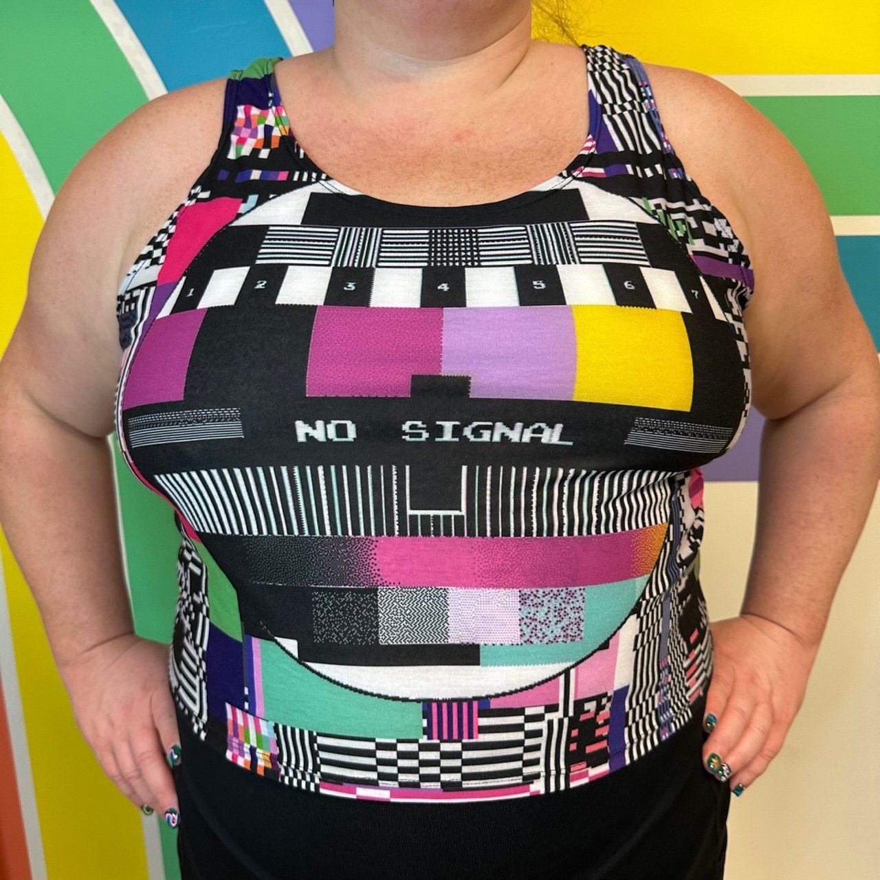 Front view of what's that noise? tv test print crop top by left turn clothing